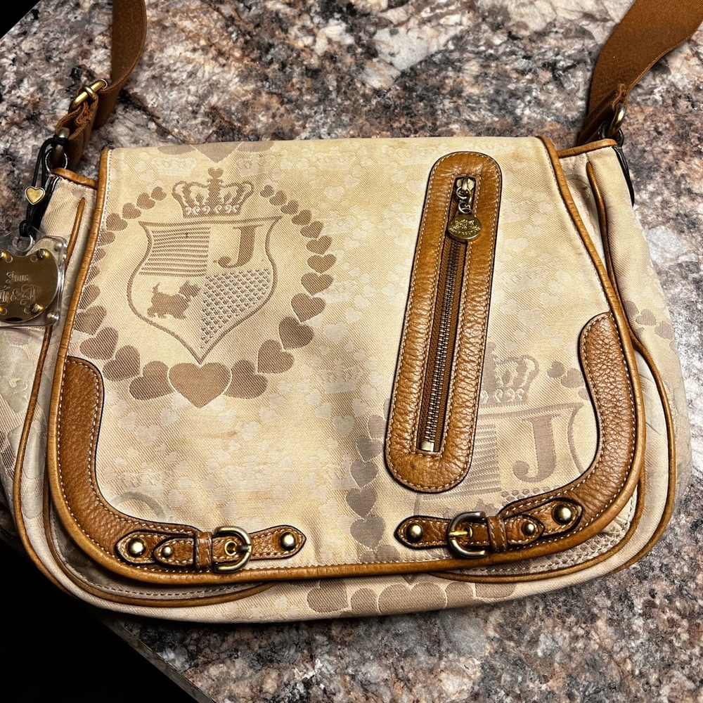 Juicy Couture messenger bag no rips or tears !